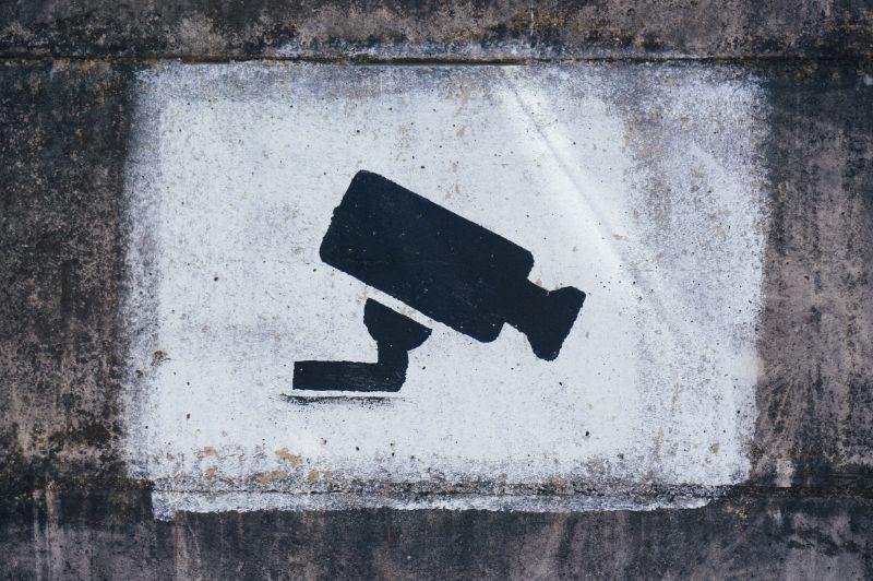 Graffiti-Bild einer Überwachungskamera
